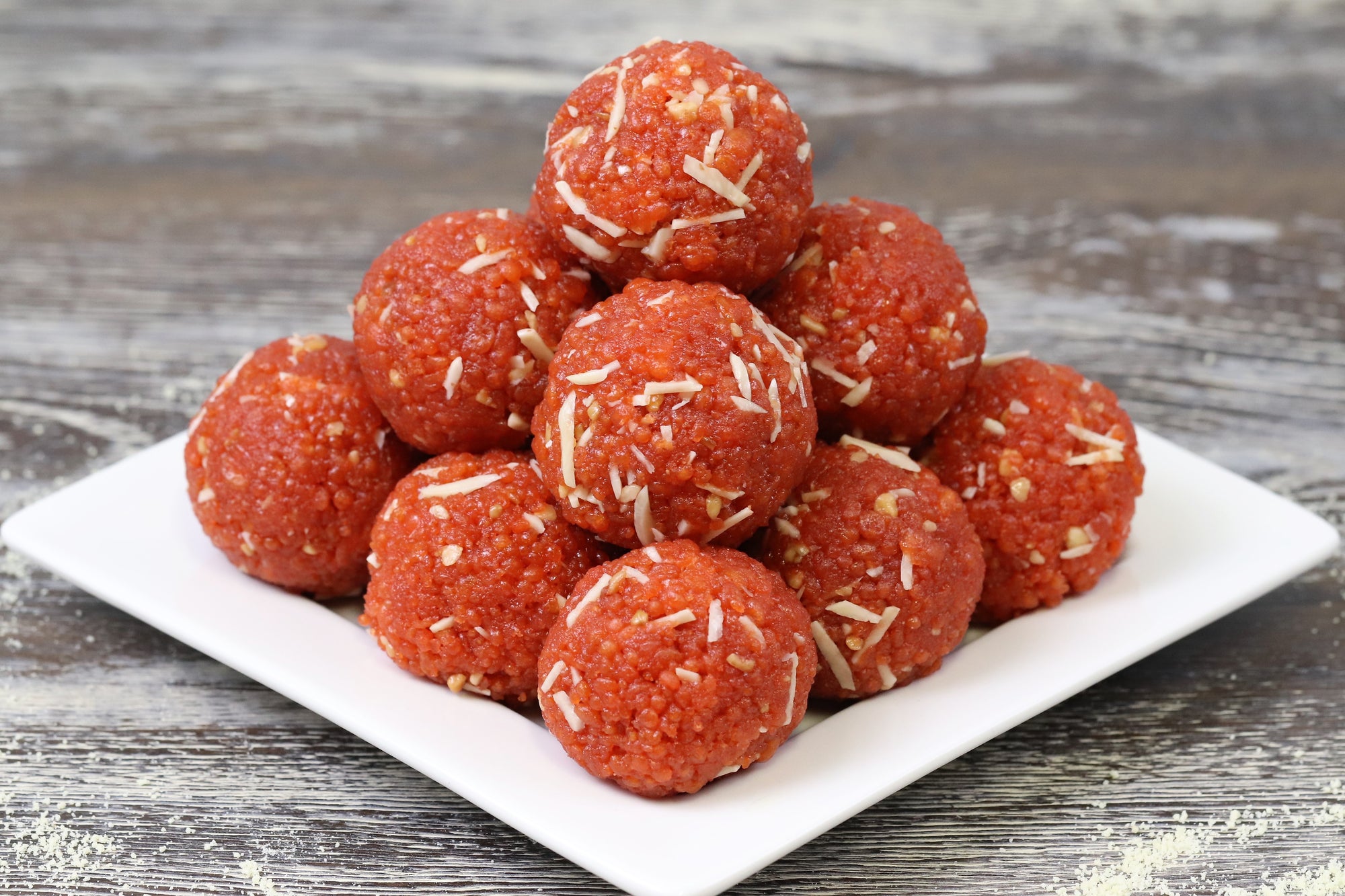 Indian sweets bundi laddu or motichur laddu or motichoor laddu, selective  focus Stock Photo by ©stockimagefactory.com 114509810